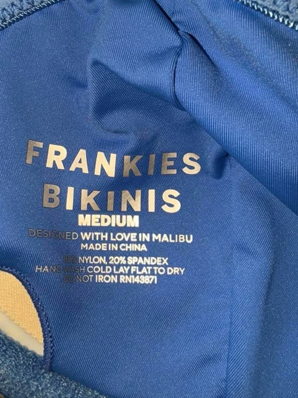 Frankies Bikinis blue with white daisies and yellow small bottoms, medium top